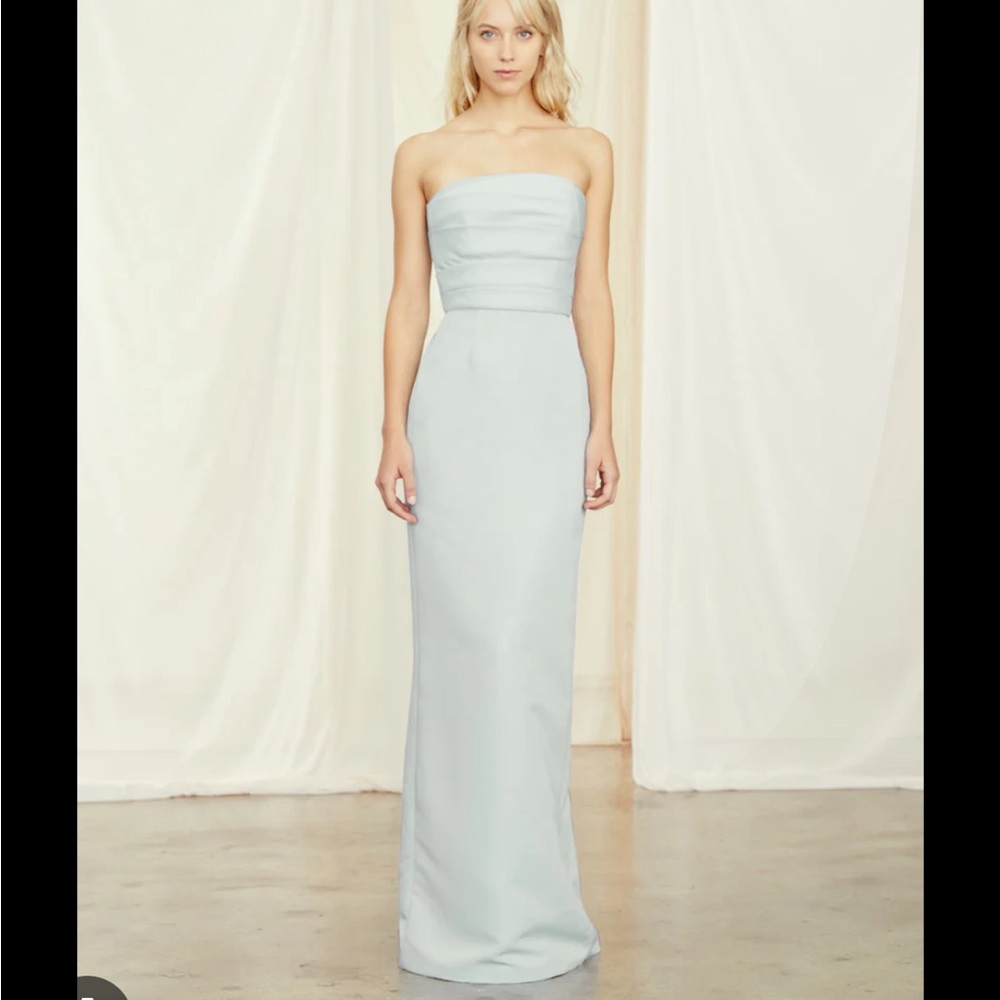 Sonia. Ice blue. No alterations. Needs dry cleaning.